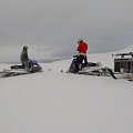 Snowmobiles are used for getting to the hunting area then hunting mountain grouse on skies or snowshoes.